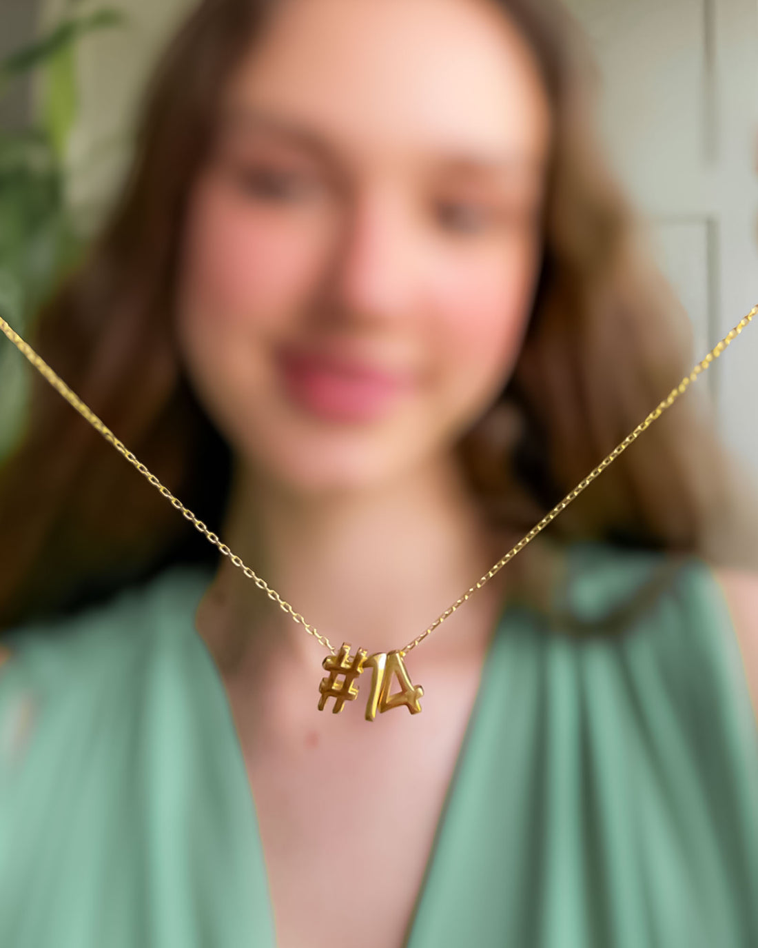Silver necklace with a unique pendant on a white background
