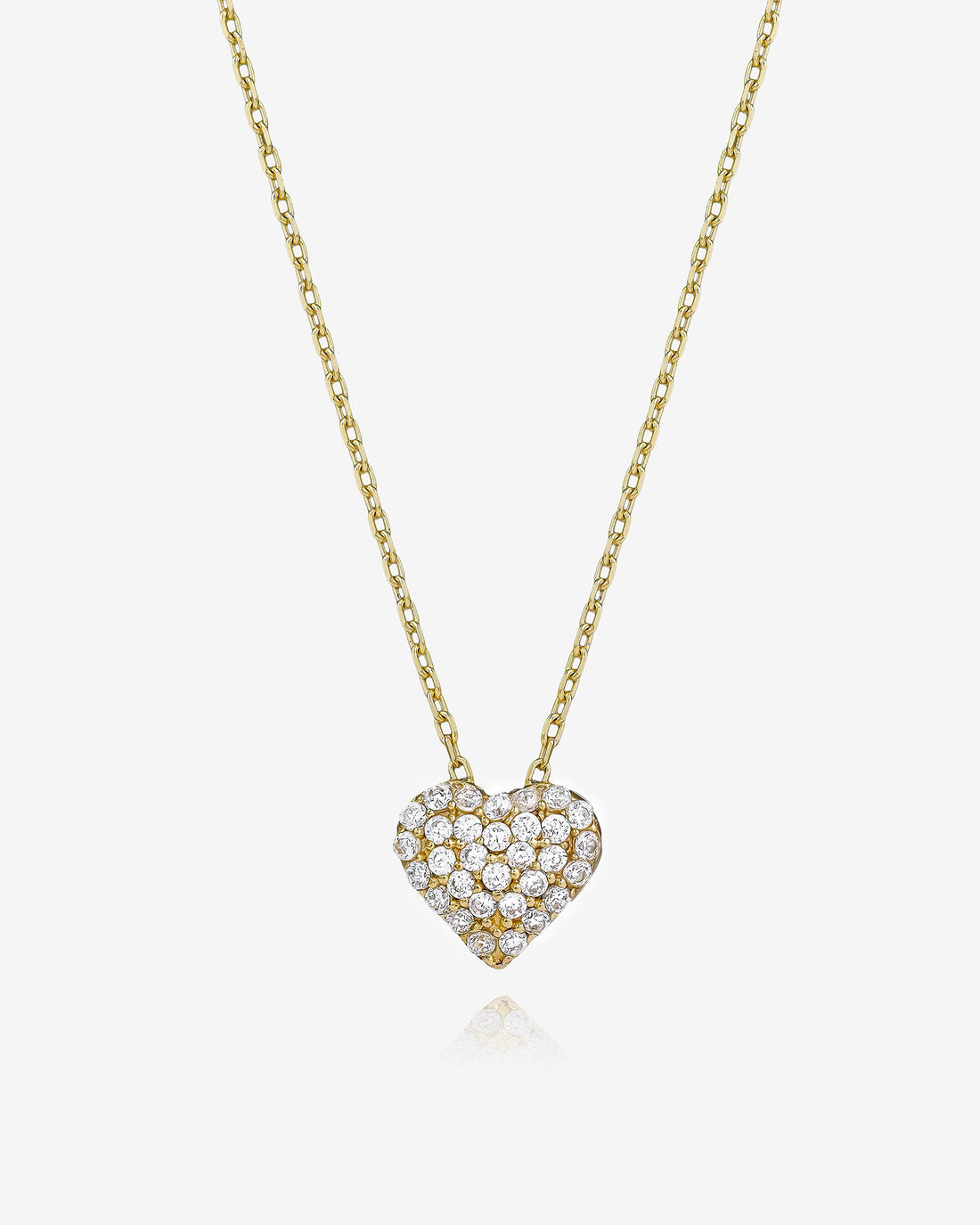Gold necklace with a heart-shaped diamond pendant on a white background