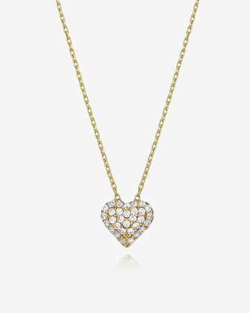 Gold necklace with a heart-shaped diamond pendant on a white background