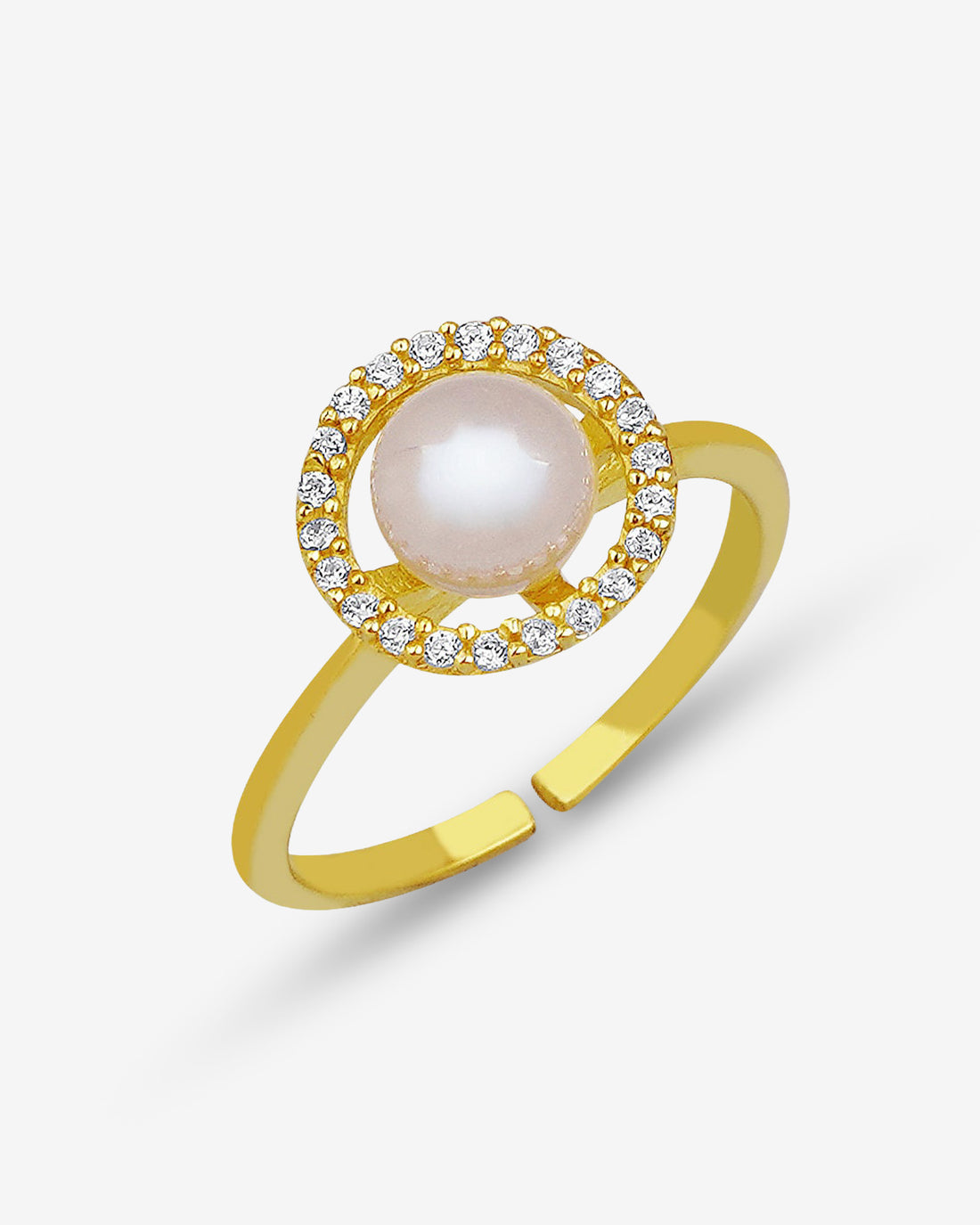 Gold ring with a pearl and diamonds on a light gray background