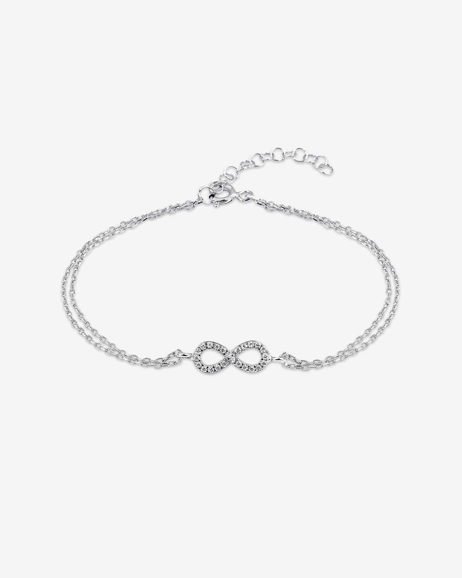 Silver bracelet with an infinity symbol on a white background