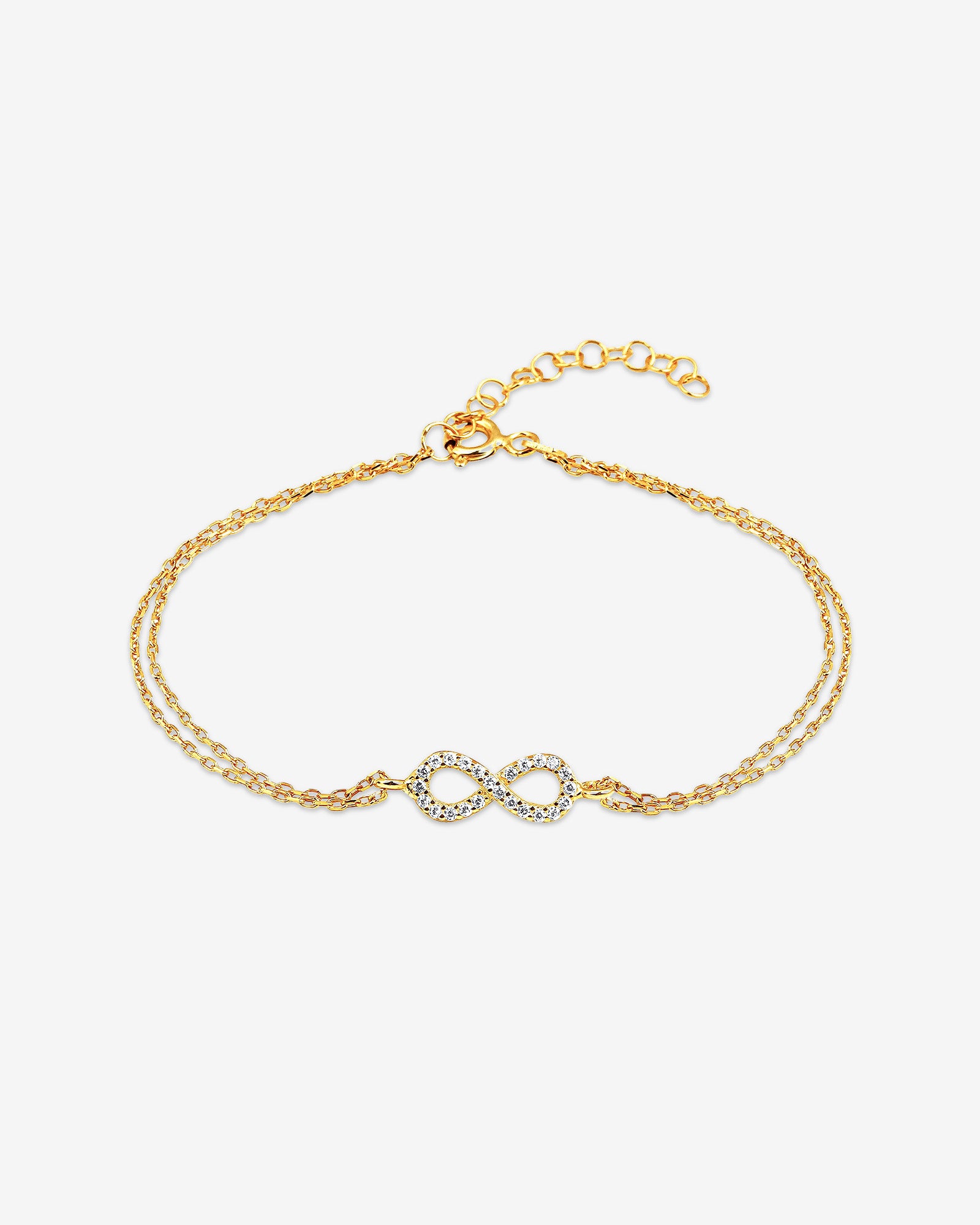 Gold bracelet with interlocking heart charms on a white background