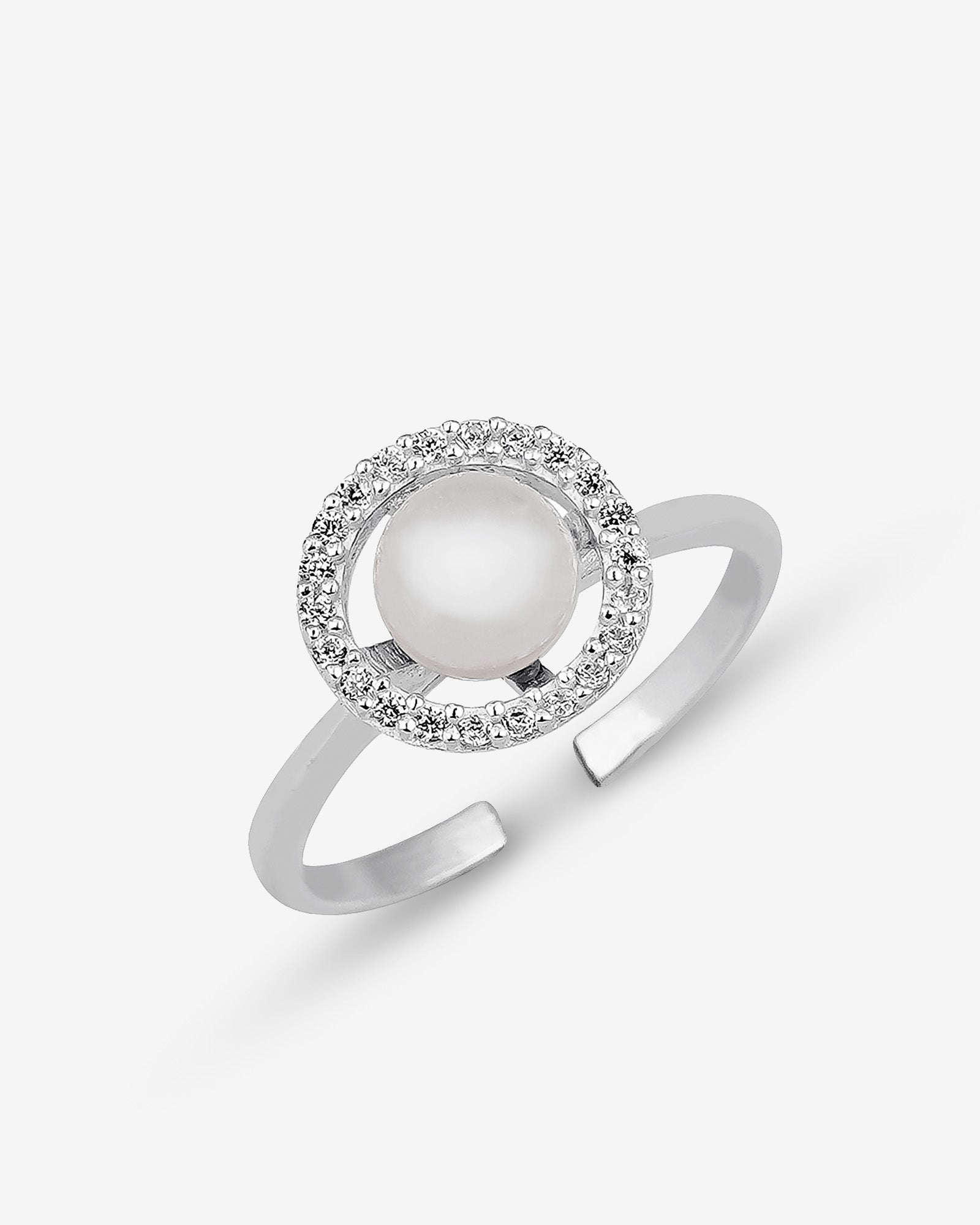 Silver ring with a pearl and diamond accents on a white background